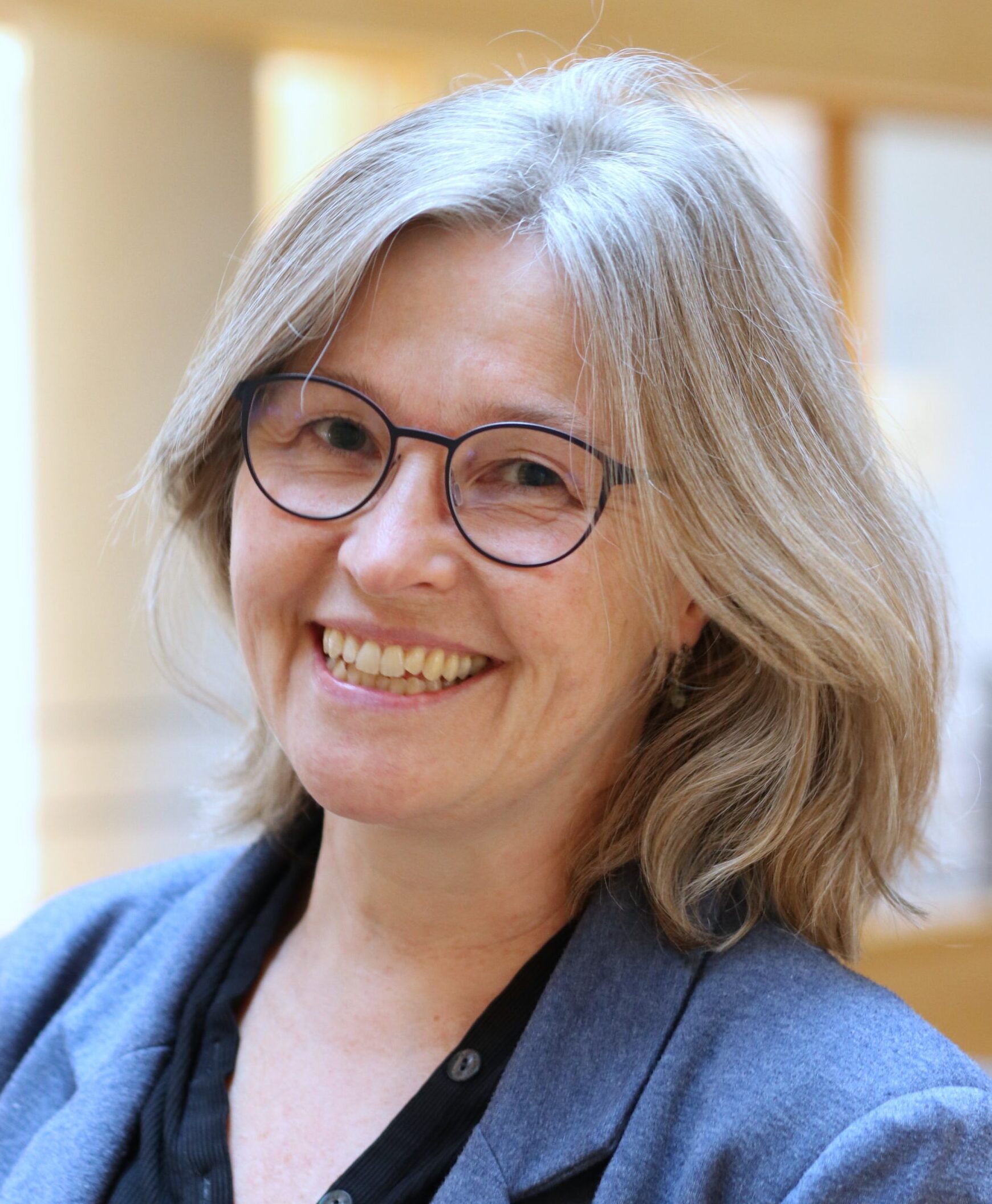 Photo of Anne-Mette Scroll